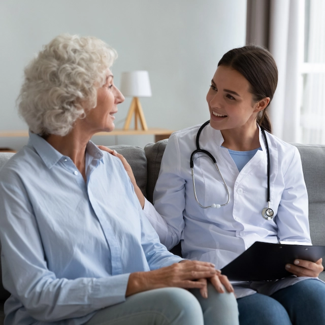 Senior woman consulting with doctor